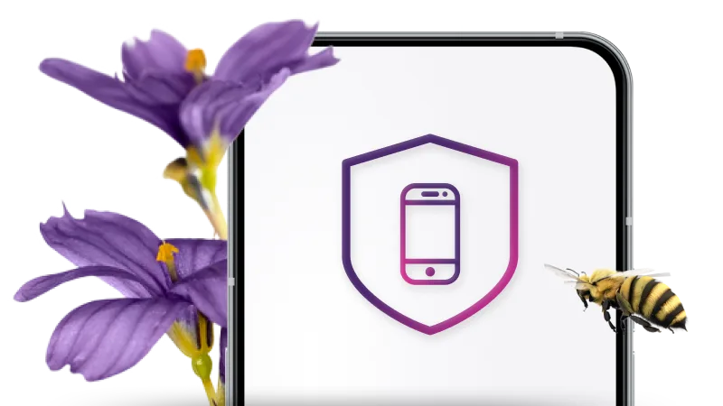 Purple flowers beside a smartphone displaying a shield and phone graphic as a bumblebee flies past.