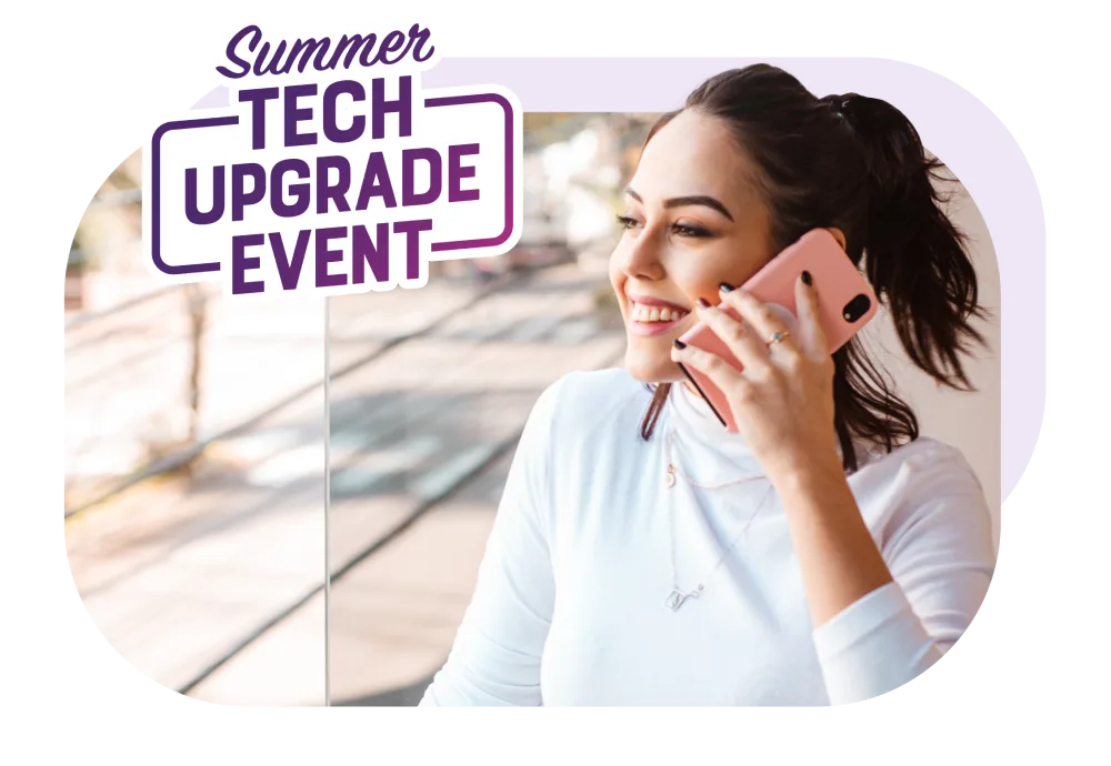 While having a conversation on the phone, a woman gazes out the window with the words Summer Tech Upgrade.