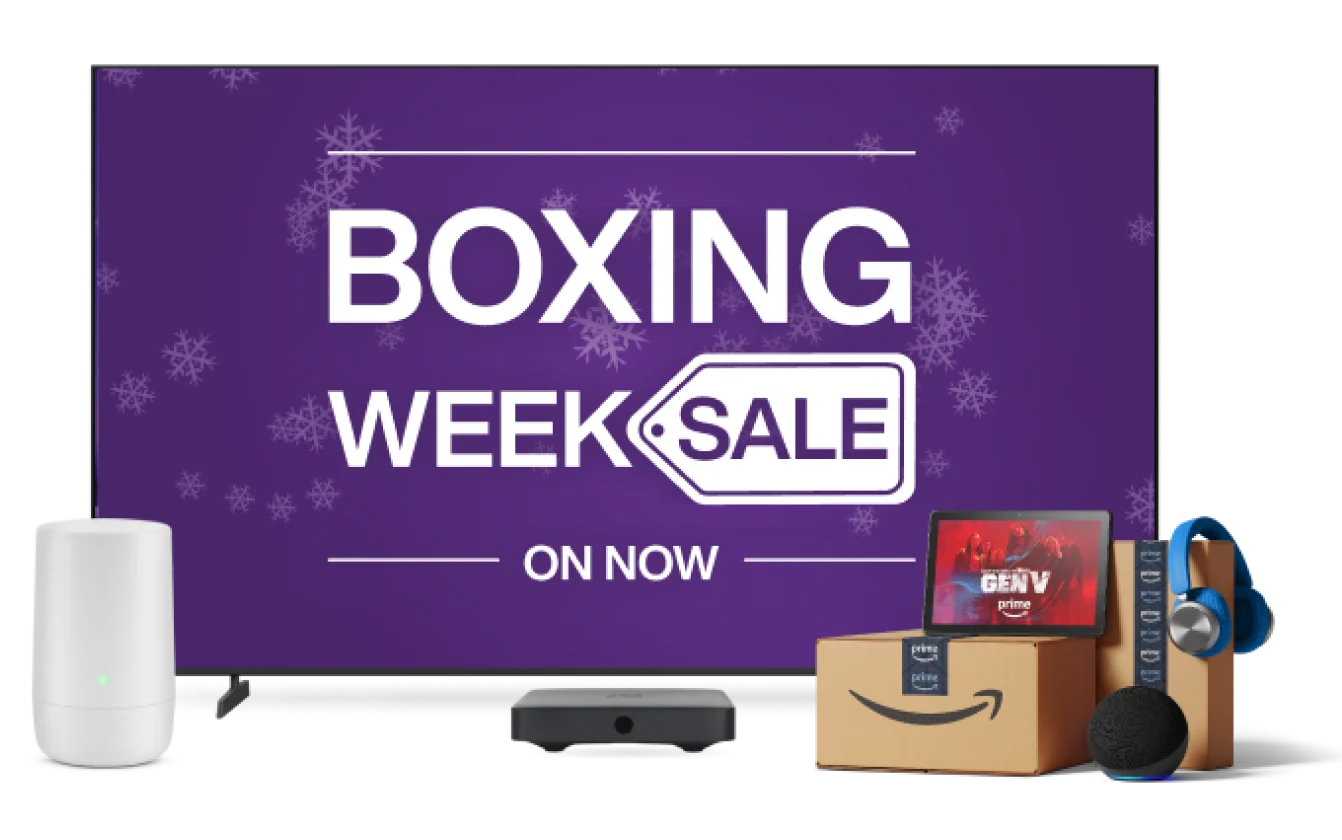 A TV, TELUS modem, tablet and Amazon parcels. The TV screen displays the text “Boxing Week Sale on now”.