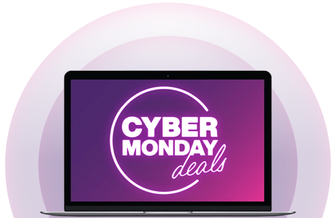 An open laptop with its screen facing forwards. On the screen there is a neon logo that reads “Cyber Monday deals”.