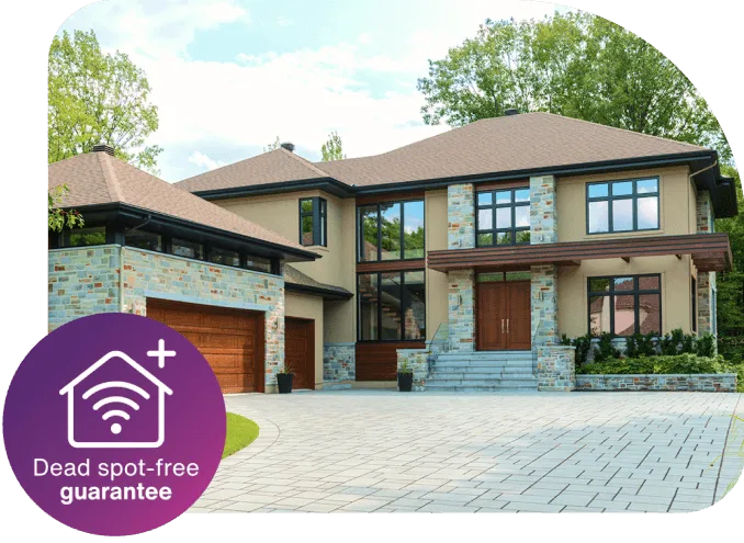 A luxury home that has TELUS Wi-Fi Plus installed. Text reads: Now with our dead spot-free guarantee.