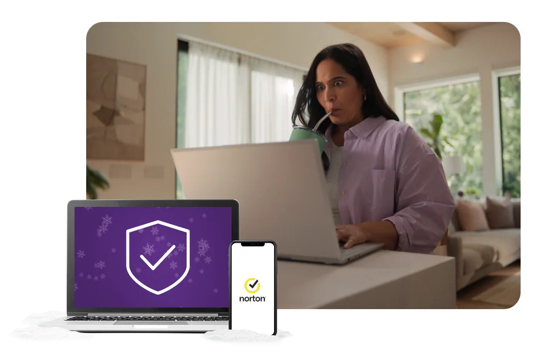 A laptop and smartphone next to an image of a woman on her laptop.