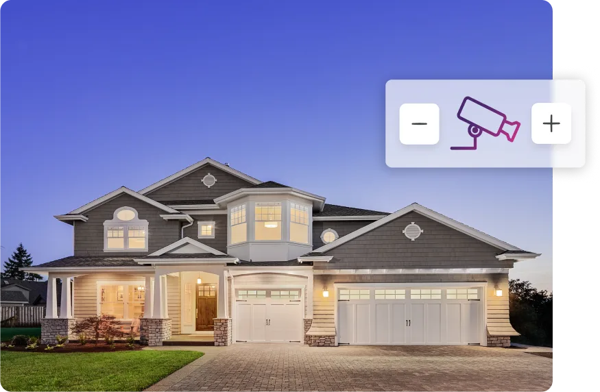 A luxury home, with an overlay of an icon to select multiple security cameras.