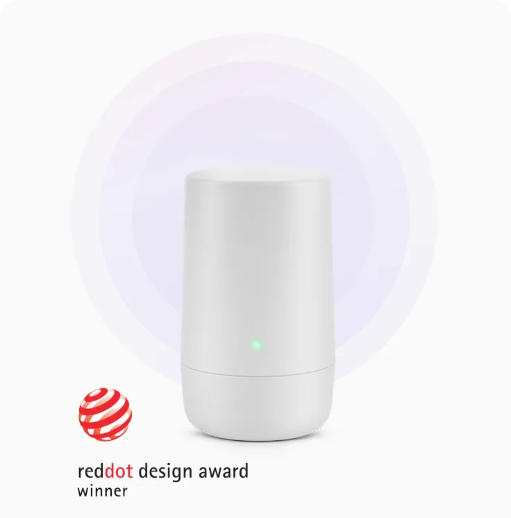 A TELUS modem with a logo for the reddot design award winner.