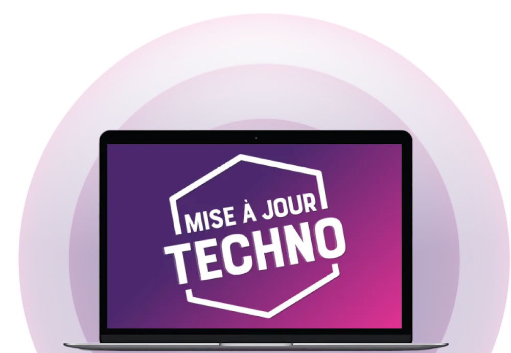 Un ordinateur portable affichant la cocarde « Mise à jour techno » sur son écran.