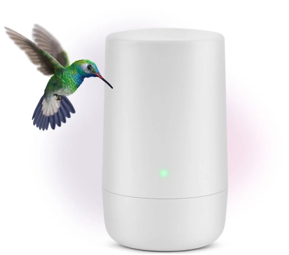 A hummingbird hovering over a TELUS wifi device, representing the speed of Wi-Fi 6E included with PureFibre Internet 1.5G and higher plans