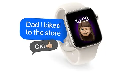An Apple Watch displaying a text message conversation that reads "Dad I biked to the store" with an "OK!" reply bubble.