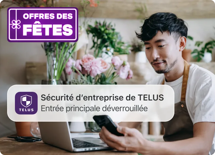 Commerçant regarde son téléphone; alerte TELUS « Person detected — Front entrance ». Pastille indiquant « Offres des Fetes ».