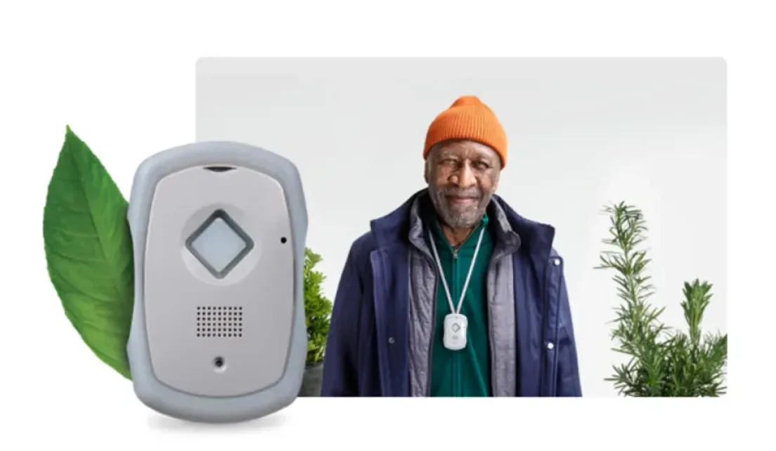 An image showing a man wearing TELUS Livingwell Companion device.