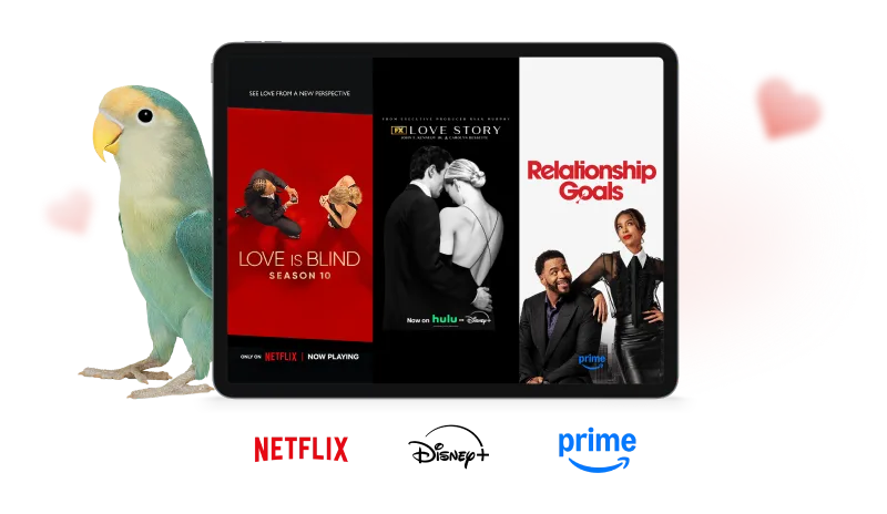 A lovebird standing next to a tablet. The tablet screen displays three posters: Love is Blind, Love Story, and Relationship Goals.
