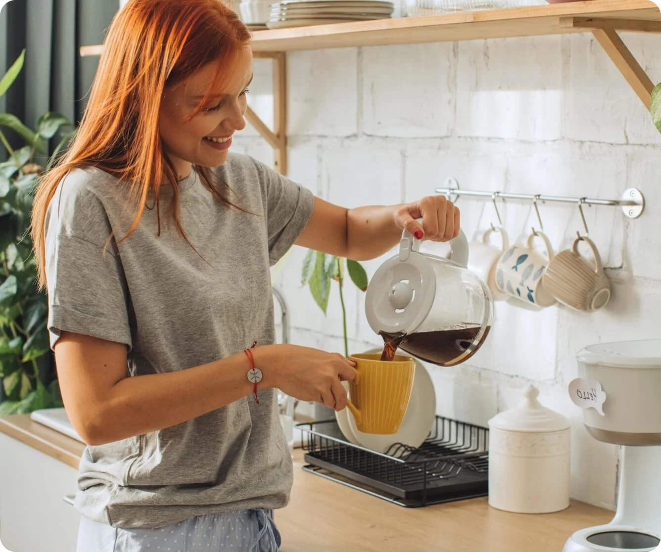 Woman pouring coffee in kitchen with smart home voice command overlay