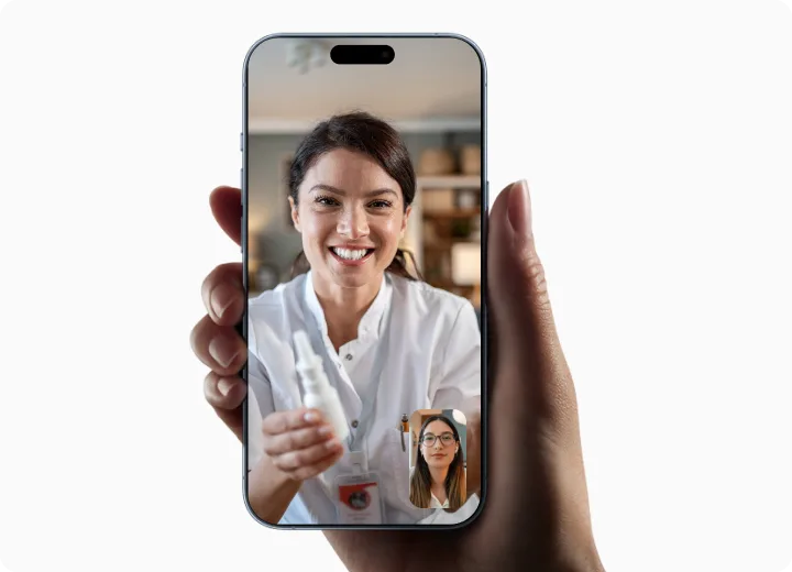 Smartphone showing a TELUS Health Virtual Pharmacy video call with a pharmacist.