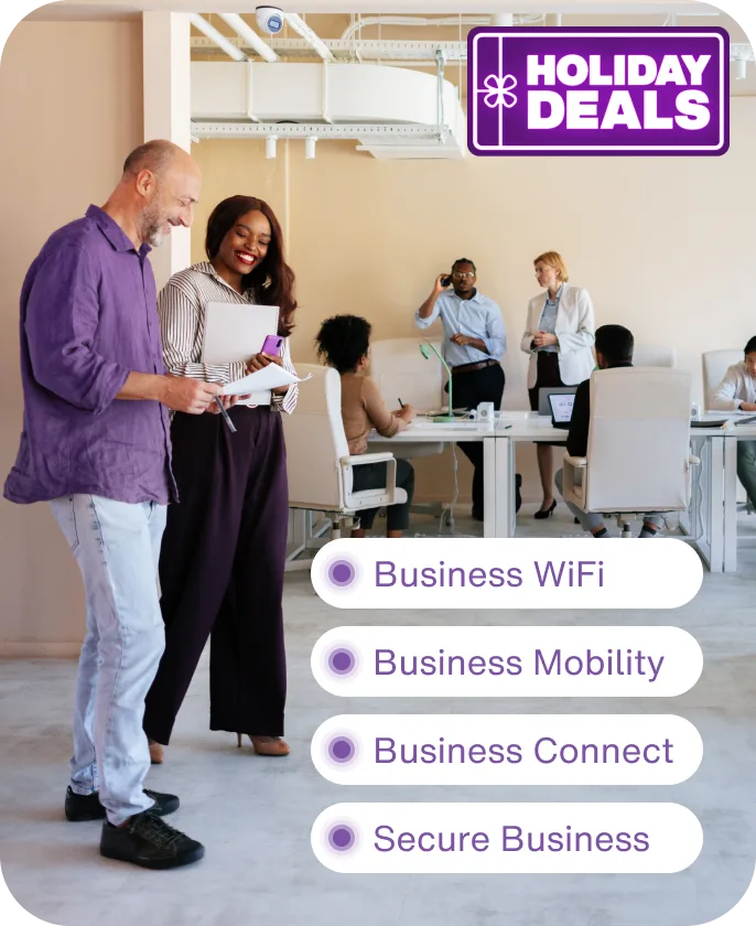 An office with various groups using all TELUS products within the workforce. A roundel reads "Holiday Sale”