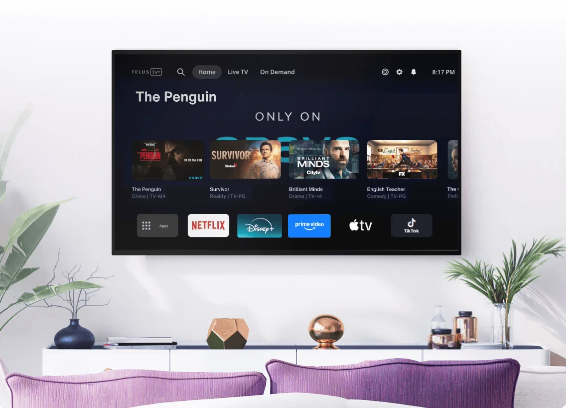 A TV screen displaying the TELUS TV home screen.