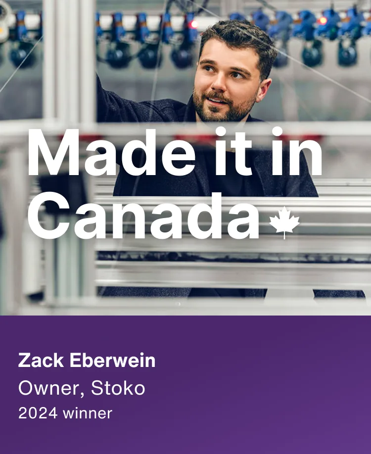 2024 Winner, Zack Eberwein owner of Stoko, working at a manufacturing facility. Overlaid text says 'Made it in Canada' with a maple leaf.