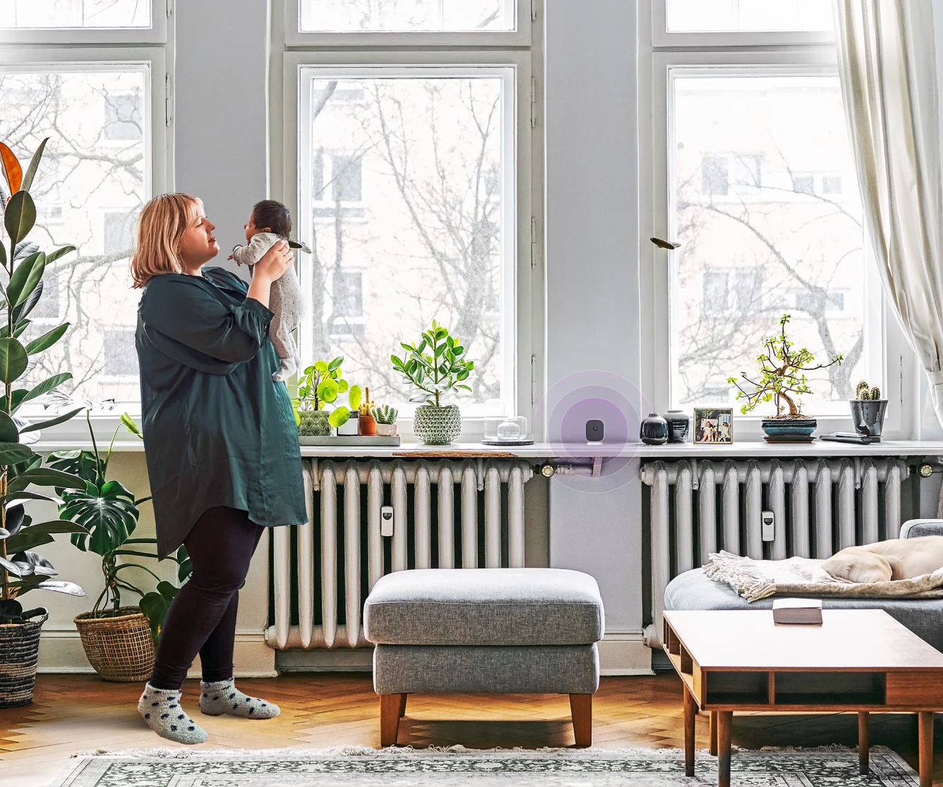 Couple using smartphone while traveling with luggage