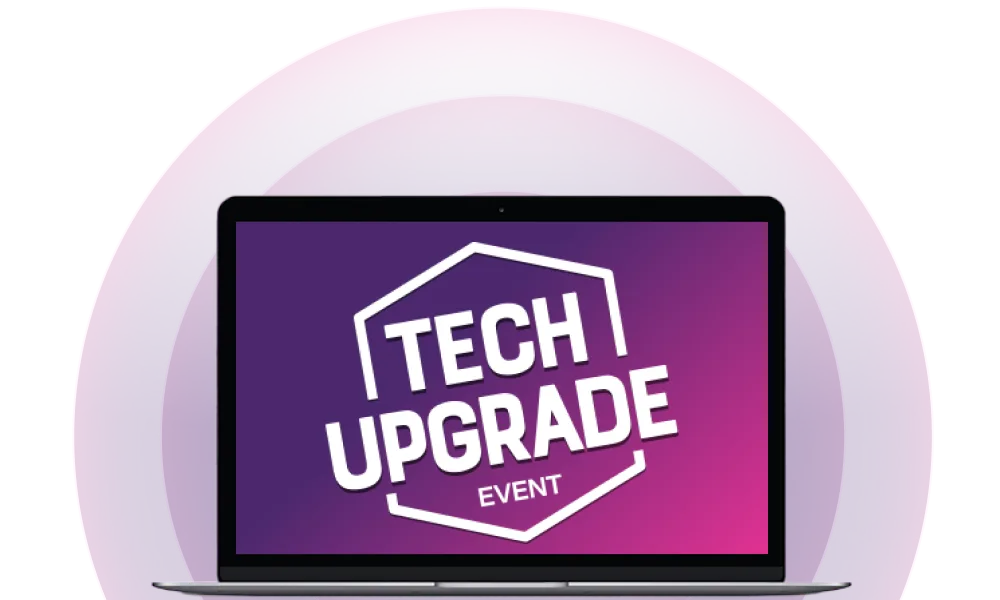 A laptop with the words Tech Upgrade event on its screen.