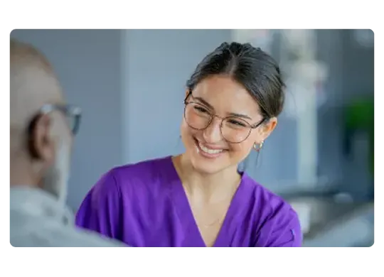 Allied health care professional consulting a patient