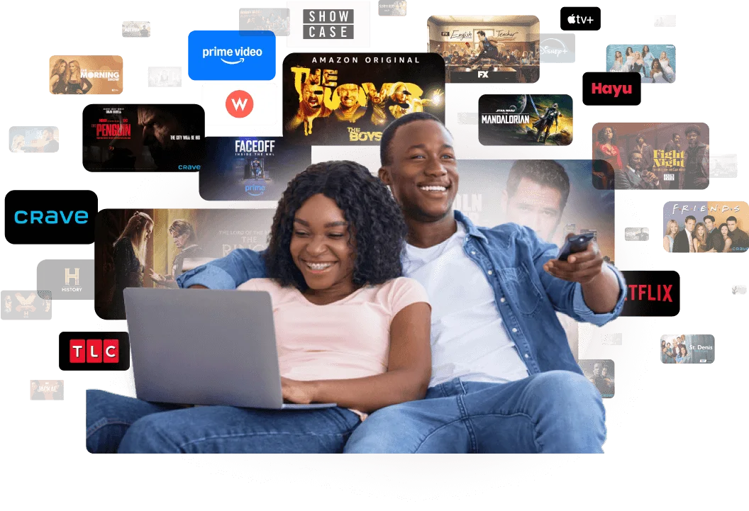 A couple browses through the various streaming options available on the TELUS TV Digital Box