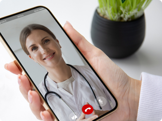Smartphone screen, showing video-chat with friendly doctor.