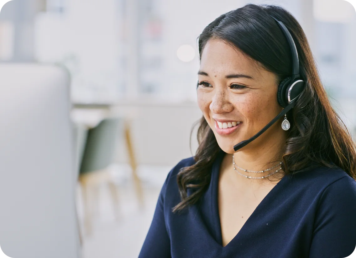Smiling customer service representative wearing headset