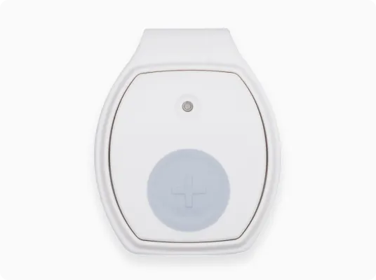 A grey TELUS Health Medical Alert device.