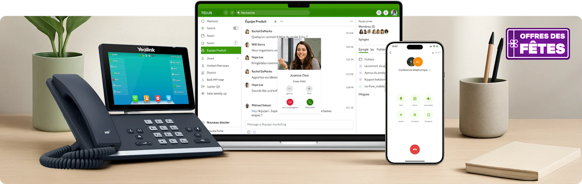 Téléphone filaire gris foncé et argent avec grand écran tactile intégré. Pastille indiquant « Offres des Fetes ».
