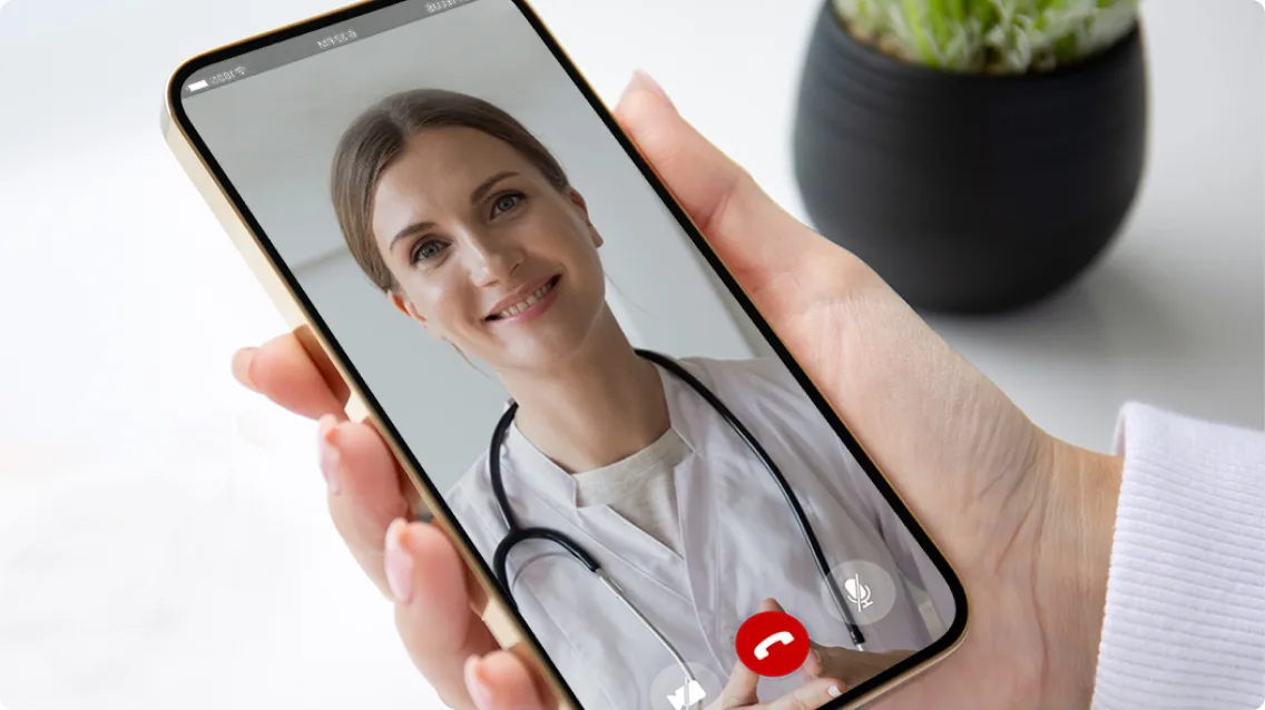 Smartphone screen, showing video-chat with friendly doctor.