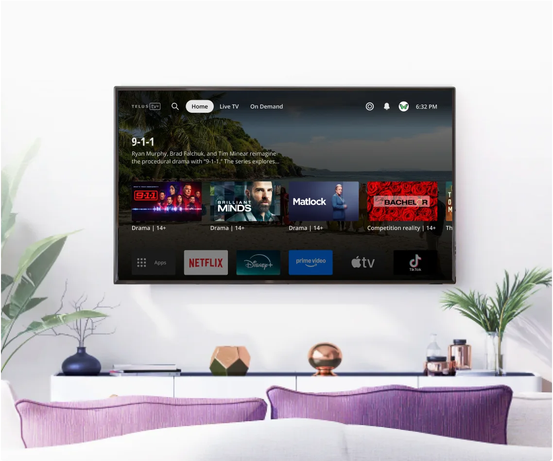 A large TV hangs on a wall displaying the Optik interface