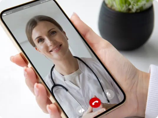 Smartphone screen, showing video-chat with friendly doctor.