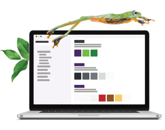 Un ordinateur portable ouvert présente une page web avec les couleurs de TELUS par-dessus lequel saute une grenouille
