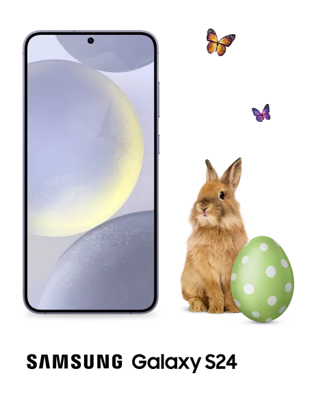 To the right of a Samsung Galaxy S24 in cobalt violet, a bunny stands behind a colourful Easter egg with butterflies fluttering gracefully in the air. 