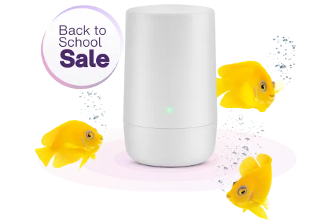 A school of fish swimming around a TELUS Wi-Fi hub. A roundel next to the image reads: Back to school sale. 