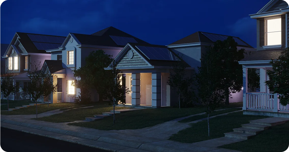 Des maisons de quartier illuminées au coucher du soleil
