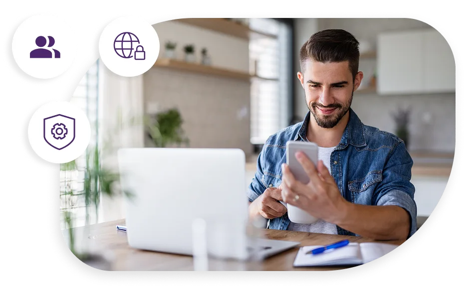 A guy browsing on his mobile and a laptop in front with TELUS icons in the background.