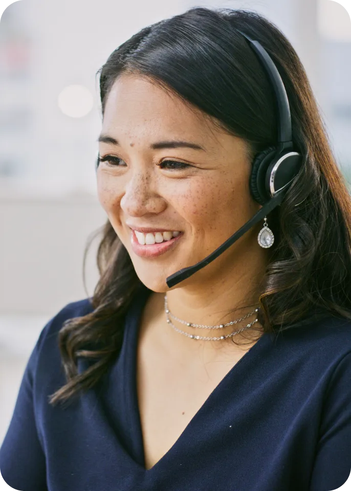 Smiling customer service representative wearing headset