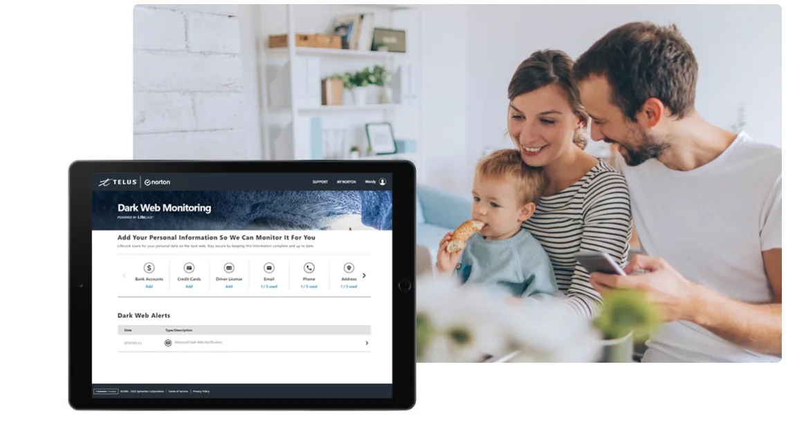 A family is seen with their devices with a close up of a tablet showing the dark web monitoring screen.