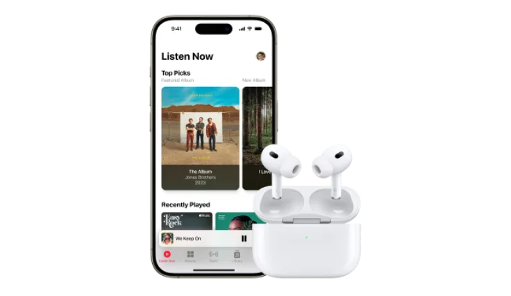 Front view of iPhone 15 Pro displaying the Apple Music app next to a pair of AirPods Pro (2nd generation).