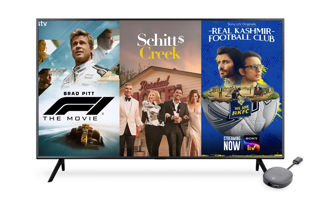 A TV screen displaying the poster for F1, Schitts Creek and Real Kashmir Football Club.