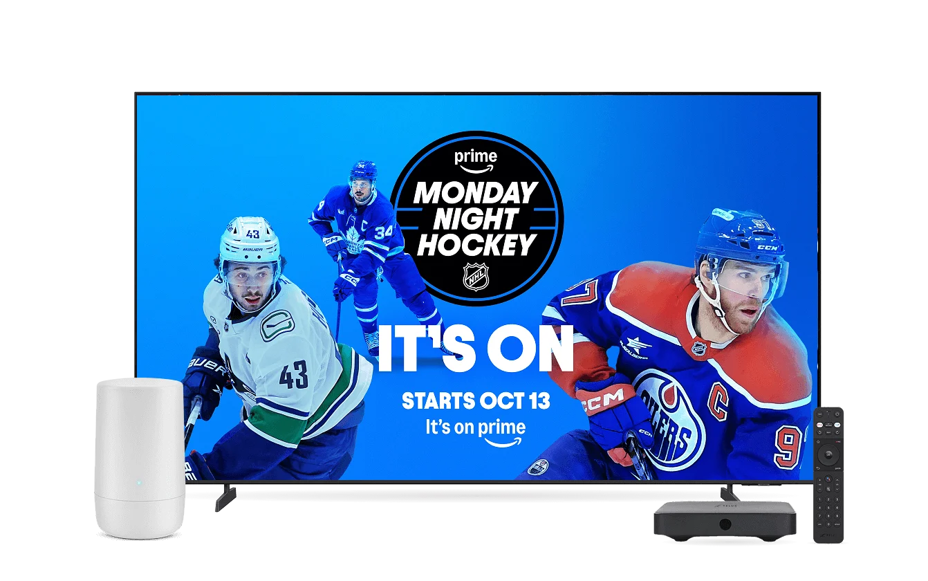 A TV, digital box, remote control and TELUS modem. The screen displays Monday Night Hockey, live on Amazon Prime.