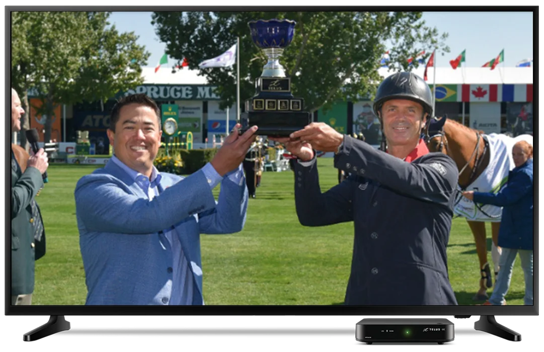 55” Samsung 4K Smart TV displaying equestrian event winners sharing a trophy, with TELUS TV box shown below the television screen.