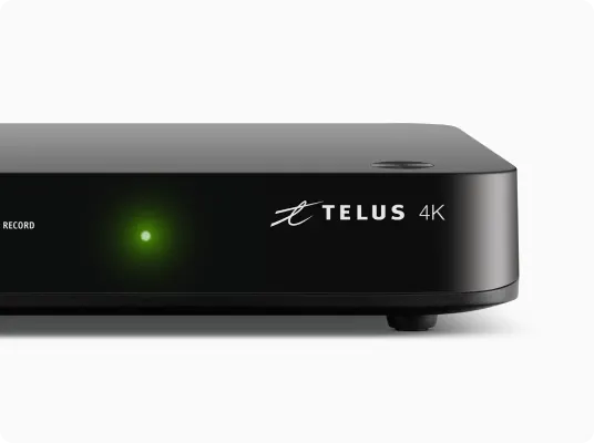 A black TELUS Optik 4K PVR device.