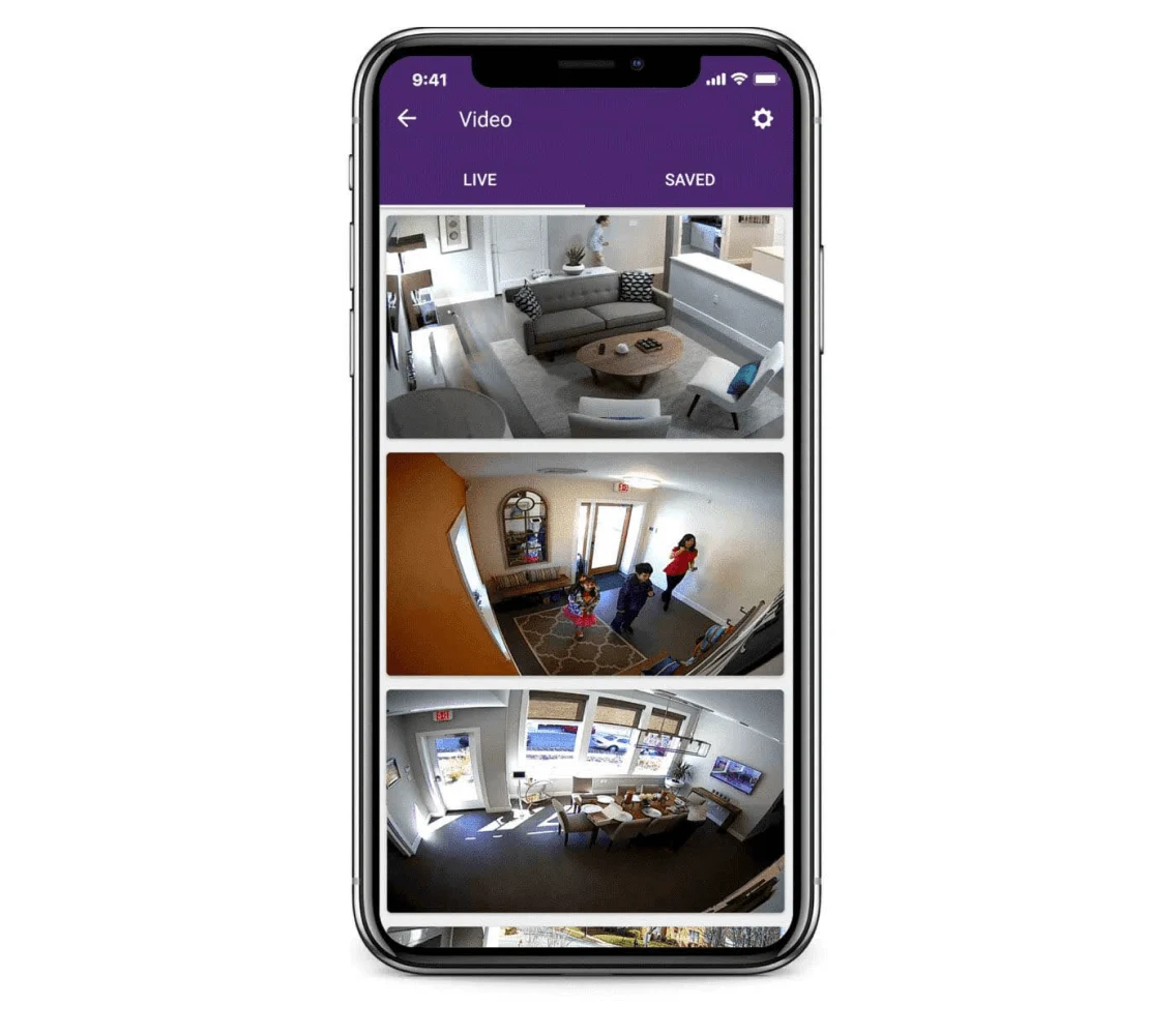 Smartphone screen displaying 3 seperate camera feeds inside a residential home