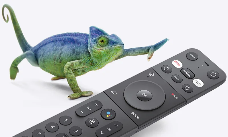 A chameleon reaching for a TELUS Optik TV remote control.