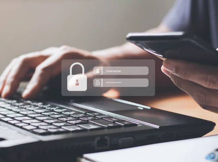 Person holding a smartphone with a password for security displayed on the screen.