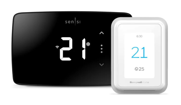 A black and a white smart thermostat.