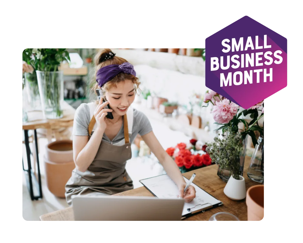 Co-owner holding a tablet. A roundel reads "Small Business Month".