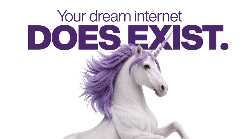 A majestic white unicorn rearing up next to the text "Your dream internet DOES EXIST."