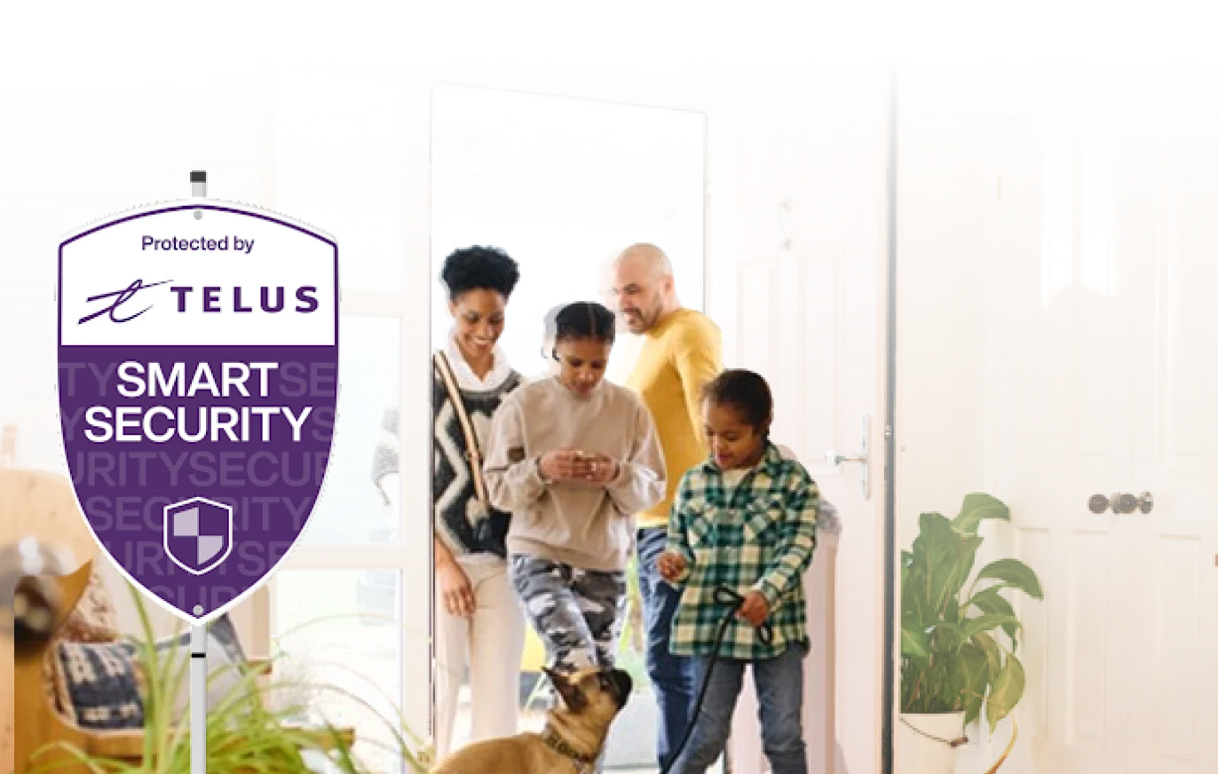 Child in plaid shirt leading small dog into modern home with family members and TELUS security sign visible