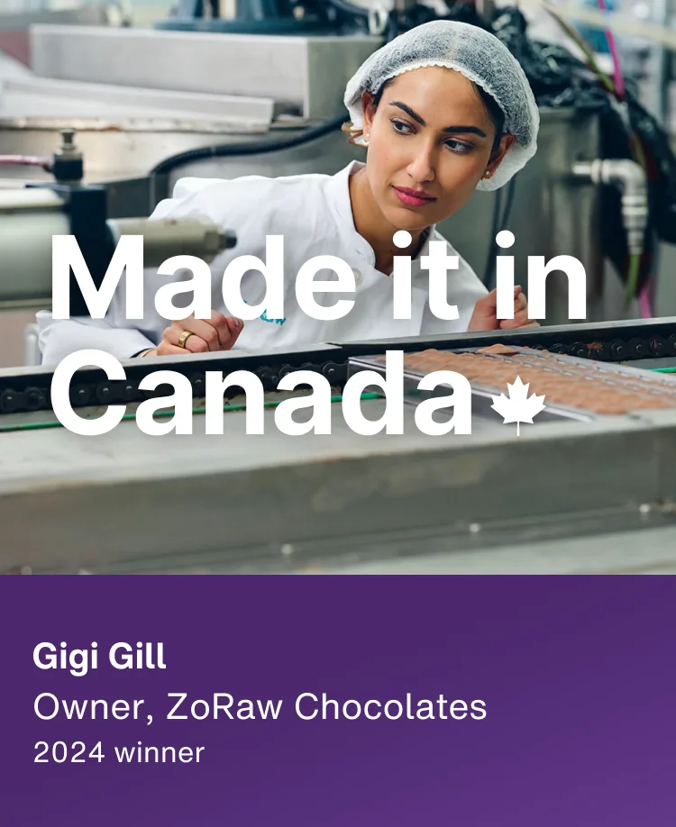 Gigi Gill, 2024 winner and owner of ZoRaw Chocolates, is shown in her chocolate manufacturing facility inspecting the production line. The overlay text reads ‘Made it in Canada,’ with a maple leaf.